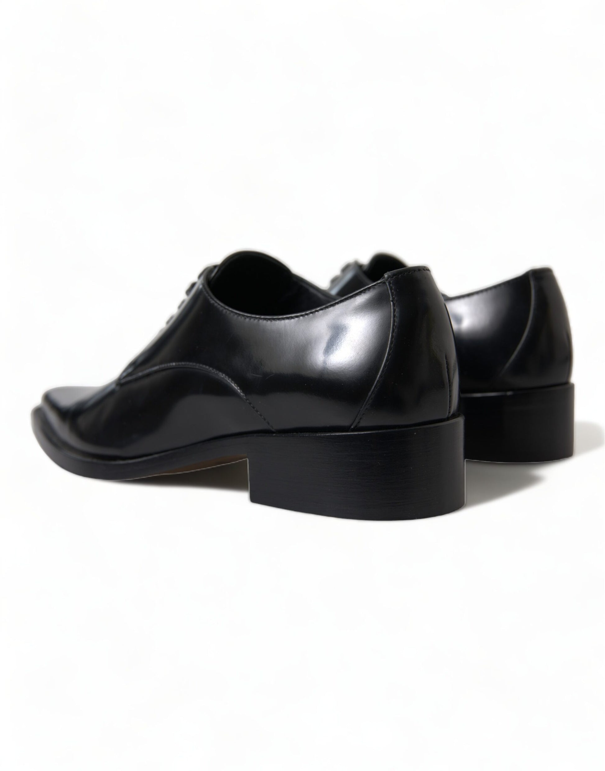 Pair of black shoes with a chunky heel and a pointed toe