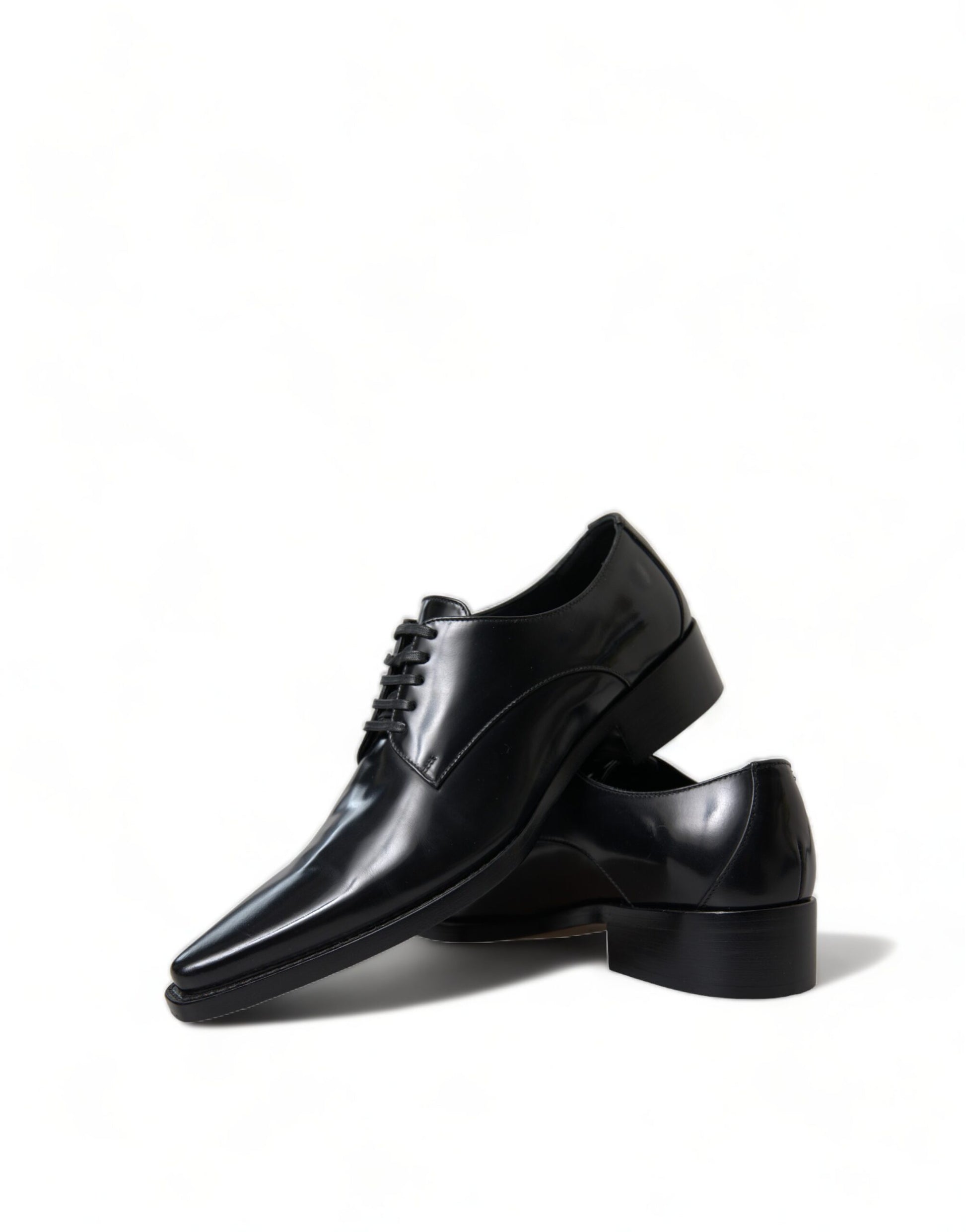 Black leather dress shoes with laces and a small heel