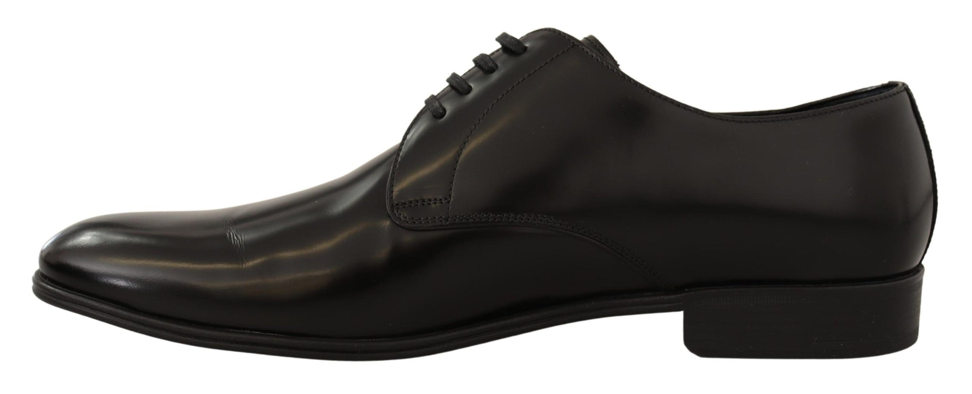 Pair of black dress shoes with laces and a small heel