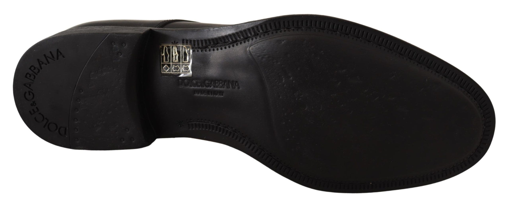 Pair of black boots with laces and a zipper on top