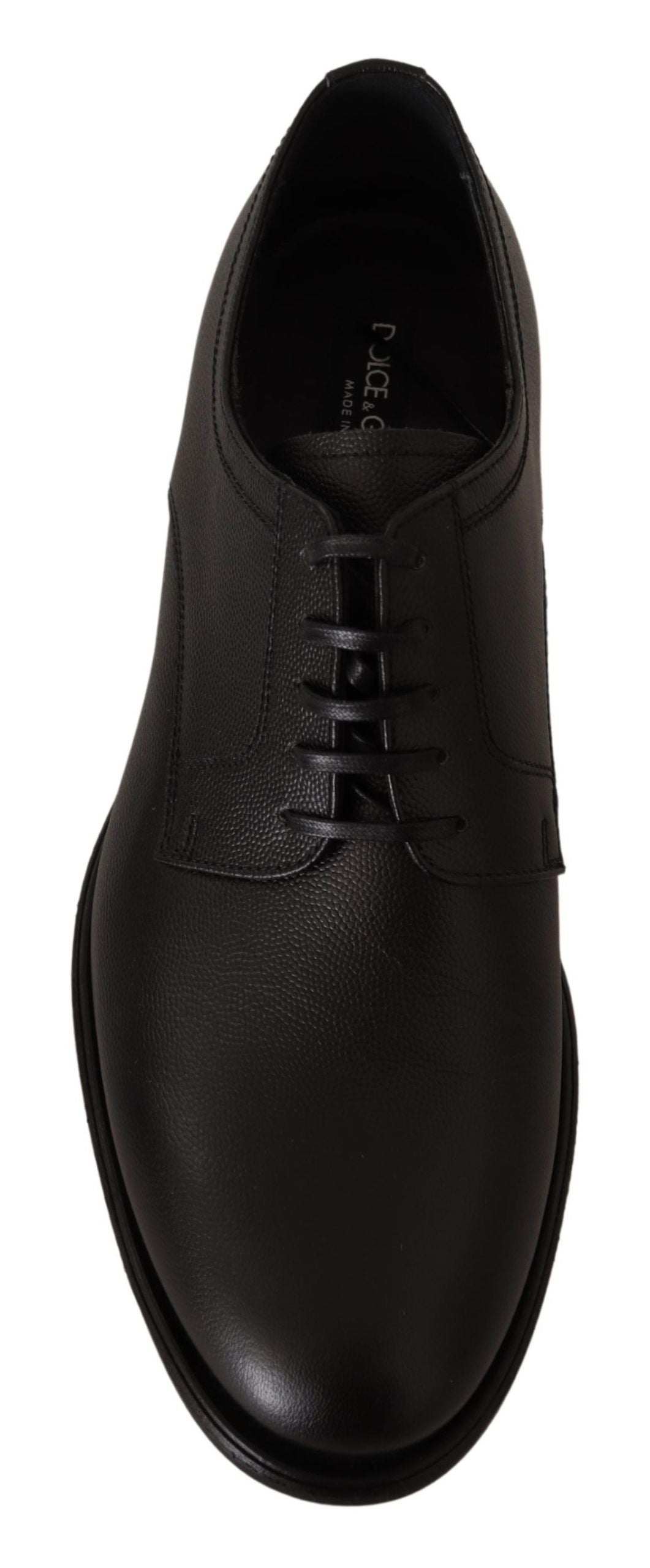 Black dress shoe with laces and a small heel