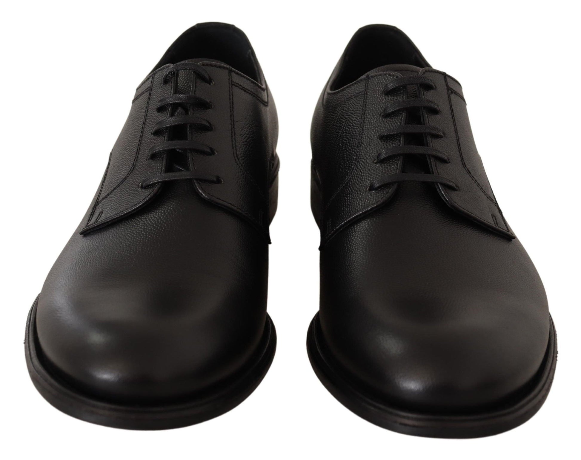 Pair of black leather dress shoes with laces and a small heel