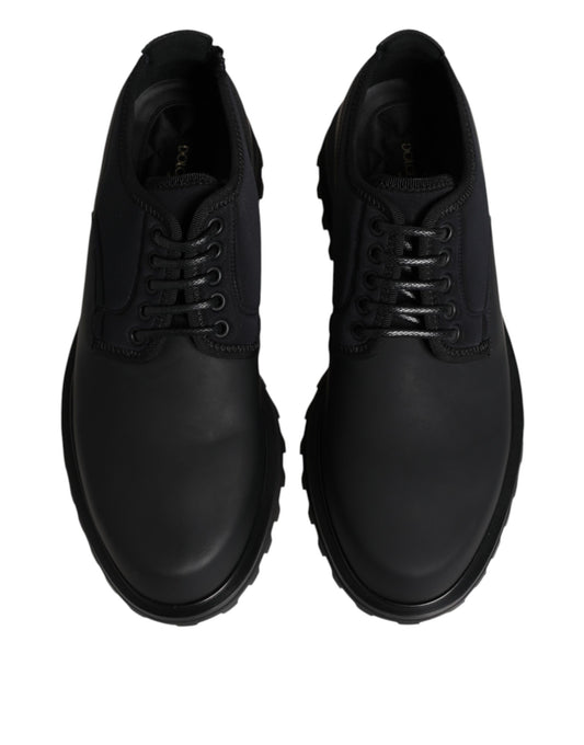 Pair of black leather lace-up shoes with rubber sole, designed by Dolce & Gabbana