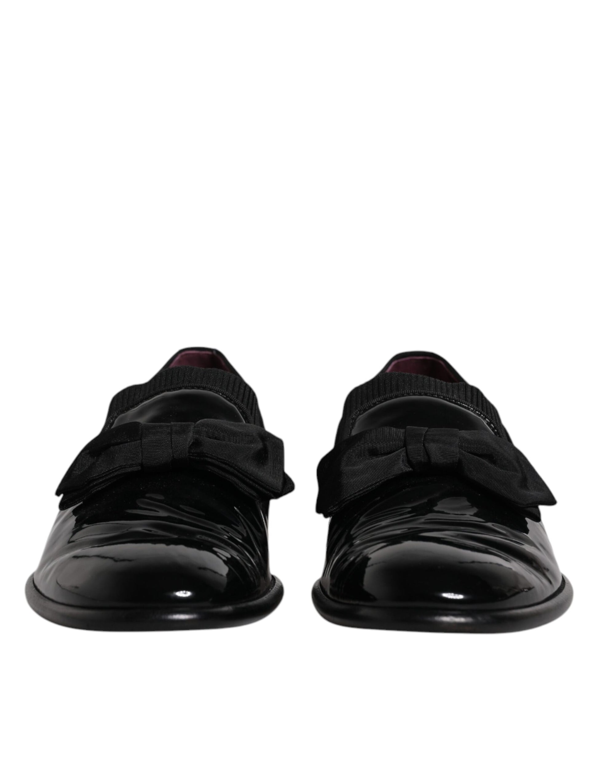 Pair of black leather loafers with silver buckle, men's formal dress shoes