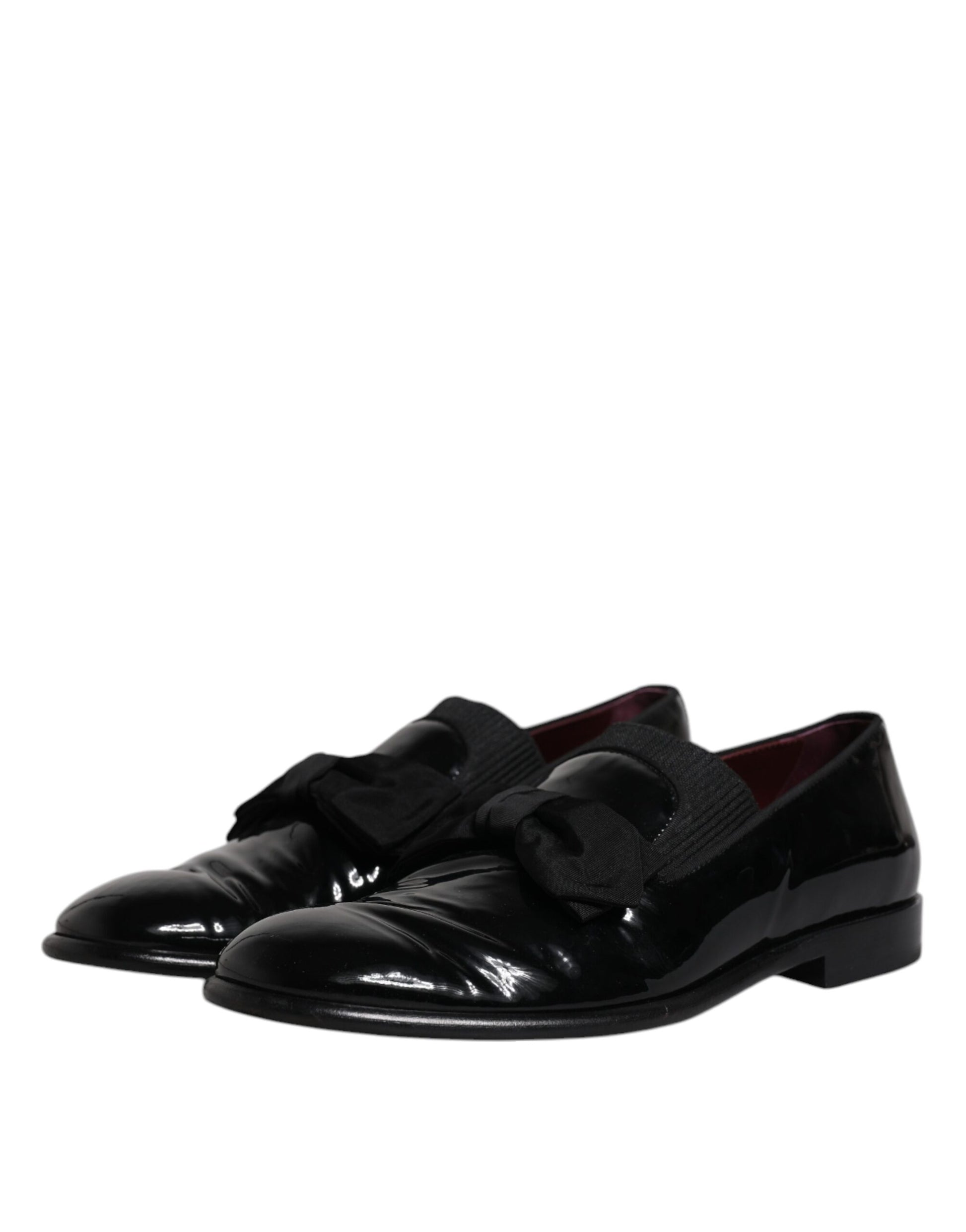 Pair of black leather loafers with laces, designed for men's formal wear