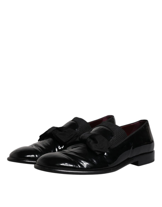 Pair of black leather loafers with laces, designed for men's formal wear