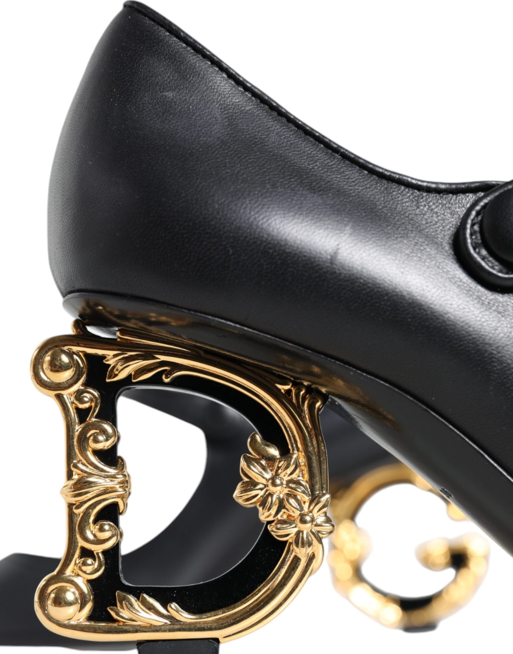 Black shoe with gold accents