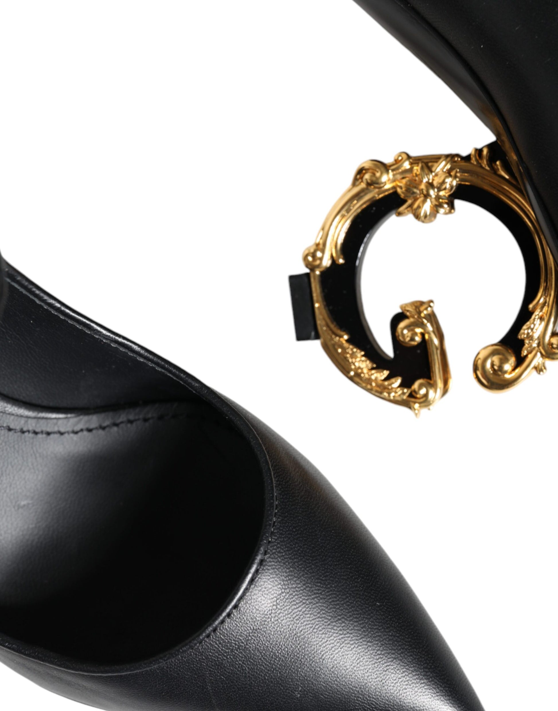 Black leather shoe with gold buckle