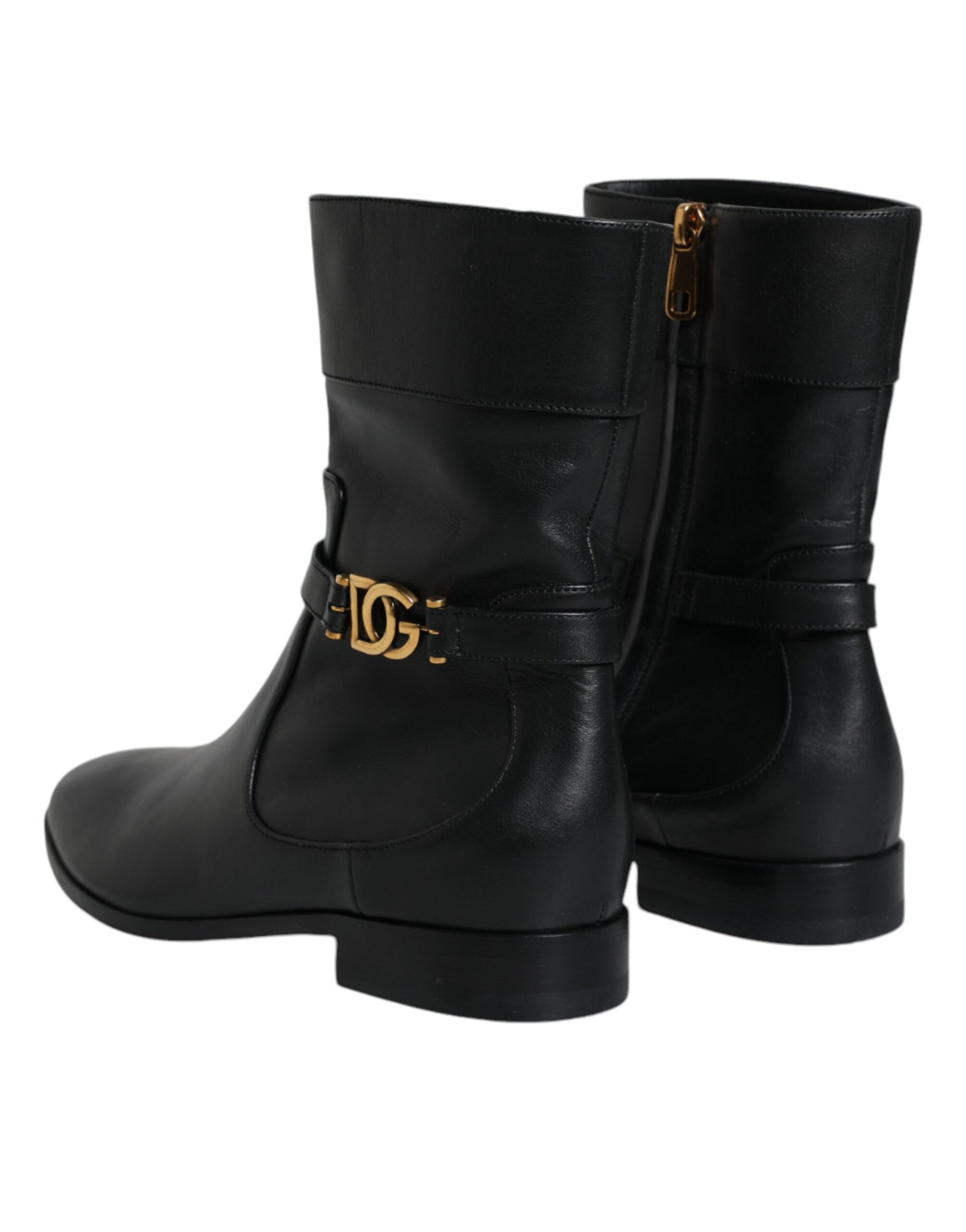 Black leather boot with gold buckle