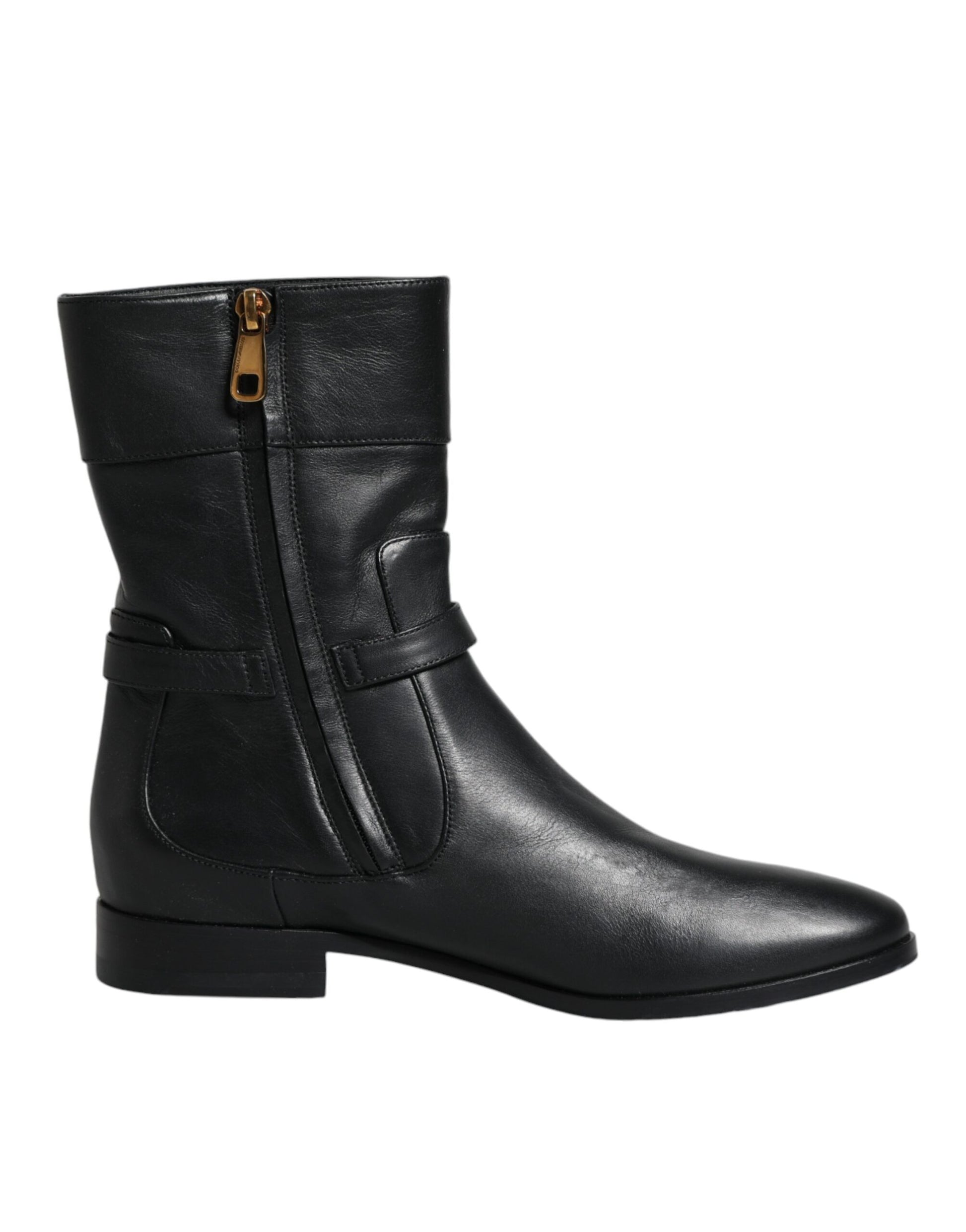 Black leather boot with gold zipper pull