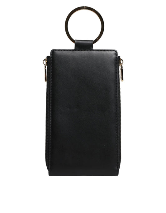 Black leather crossbody bag with gold accents