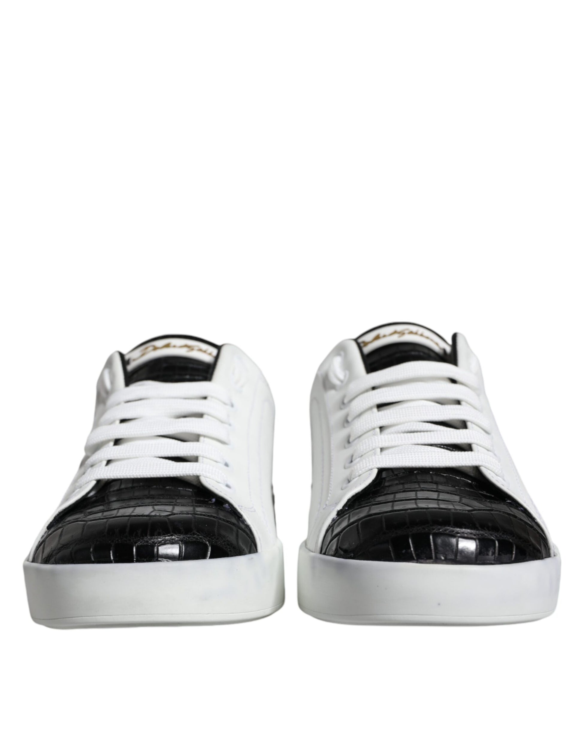 Pair of black leather sneakers with white laces and logo on side, from the Dolce & Gabbana brand