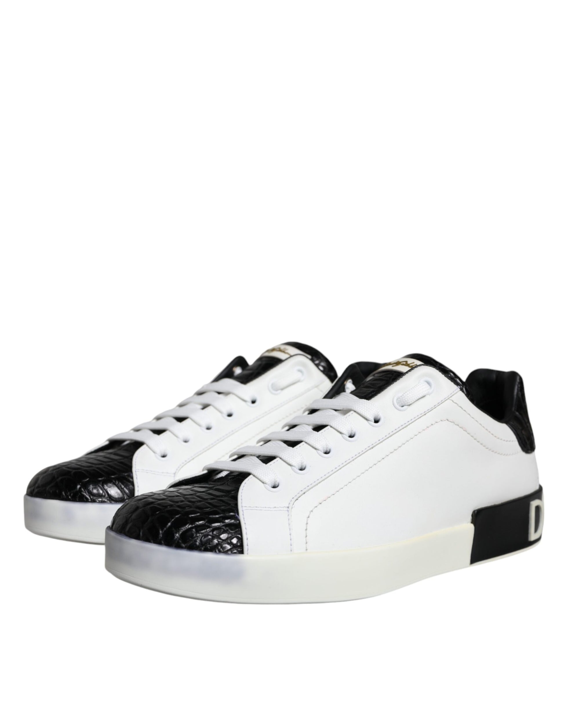 A pair of black leather sneakers with white laces and a logo on the side
