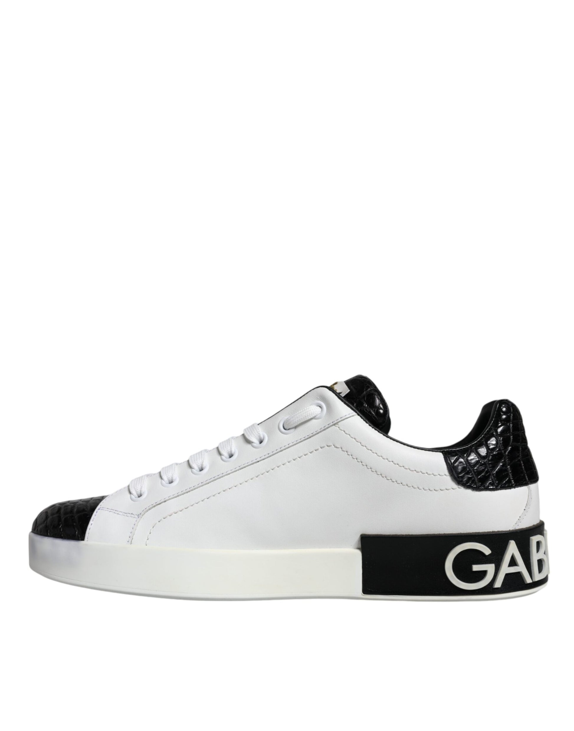 White sneakers with black laces, featuring a logo on the side and a patterned design