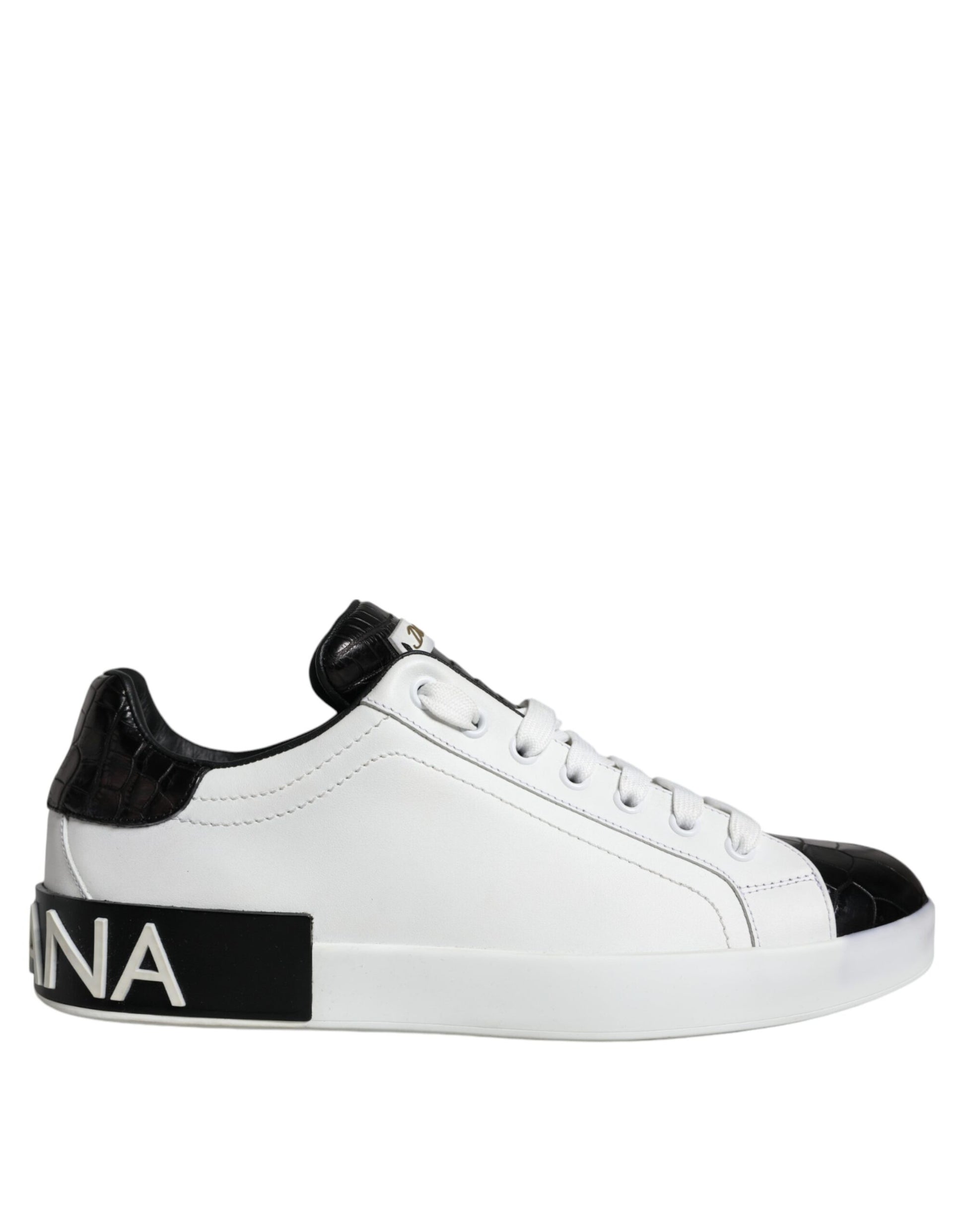 White sneakers with black laces, featuring a logo on the side and a black stripe