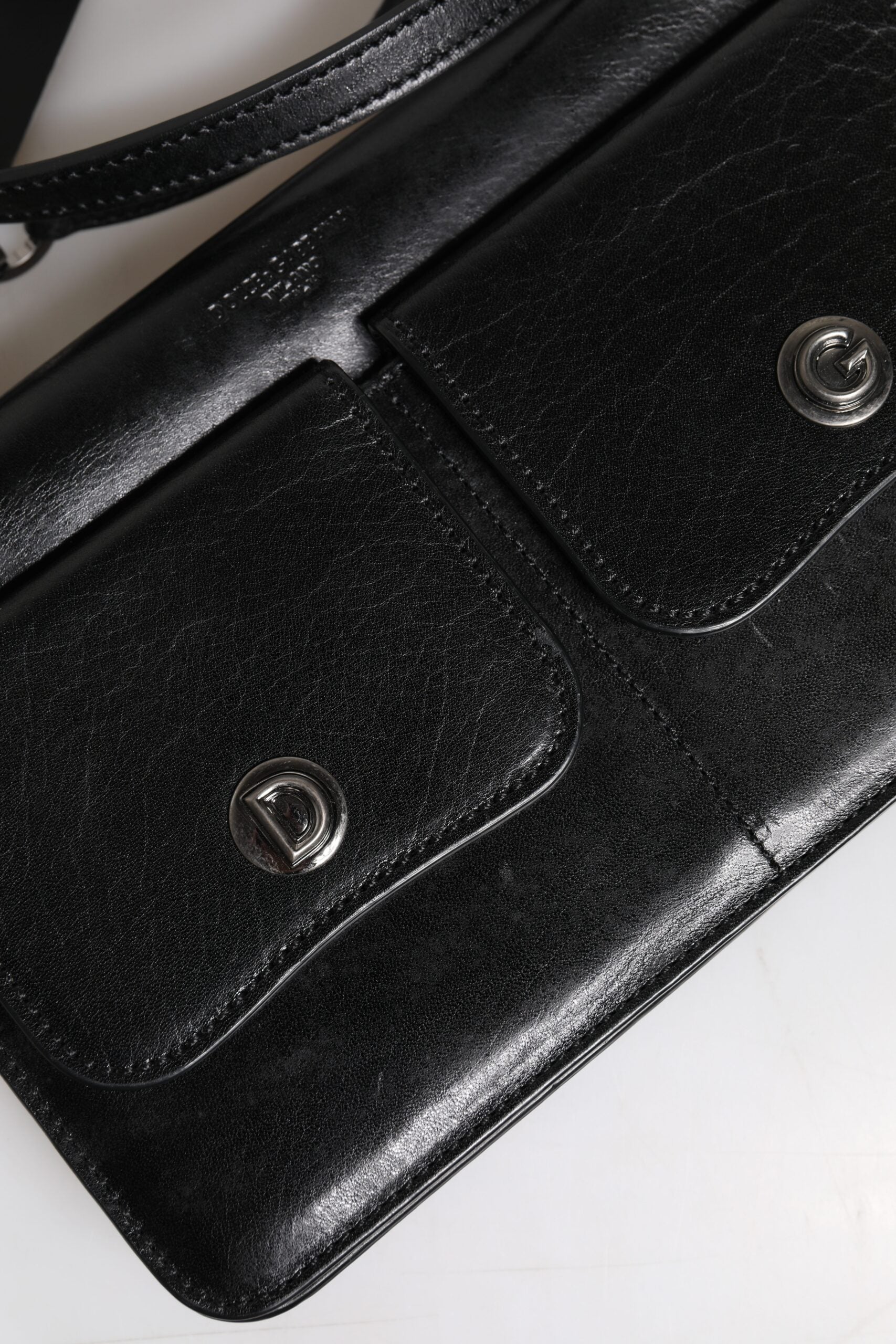 Black leather handbag with silver hardware