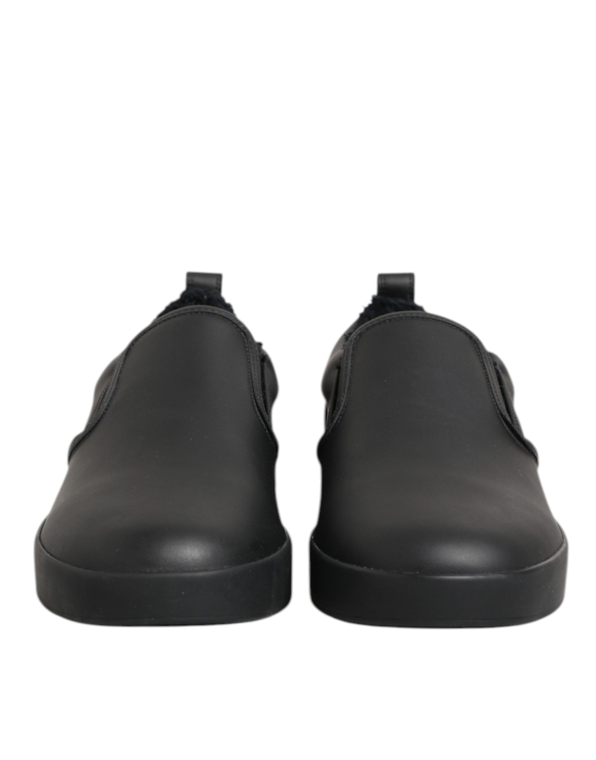 Pair of black shoes with thick soles