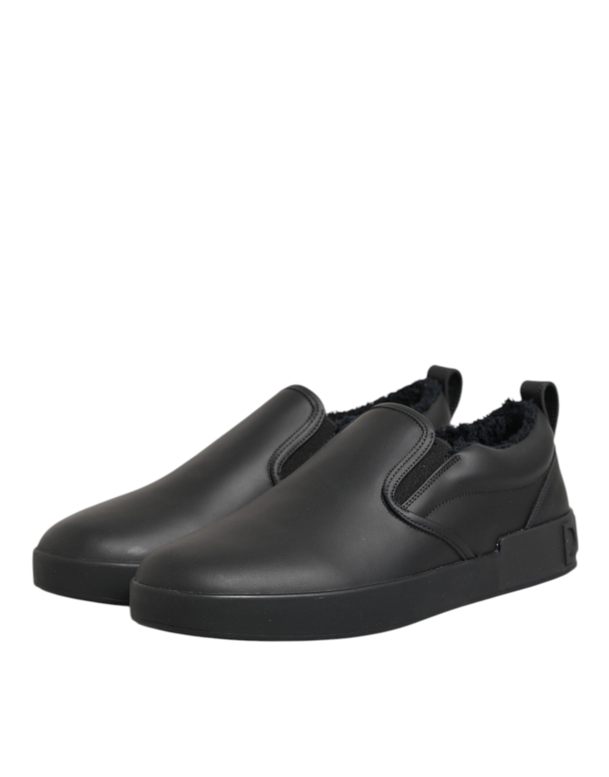 Pair of black shoes with white soles