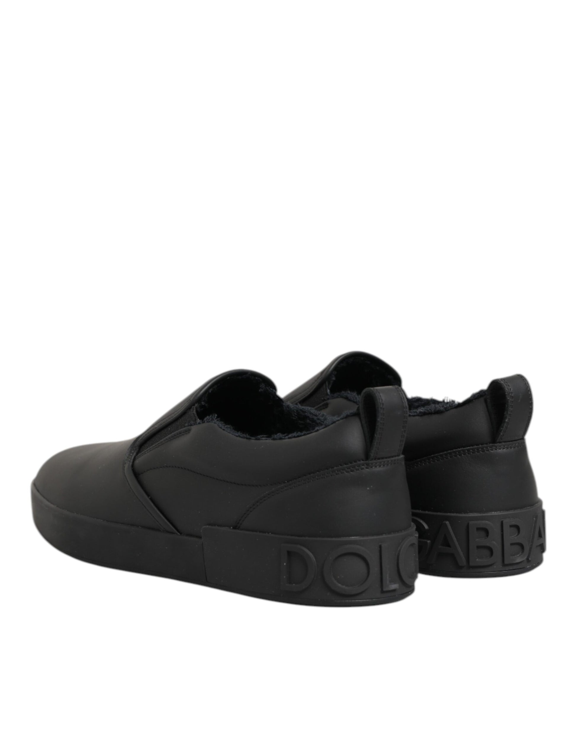 Black baby shoe with white logo on side