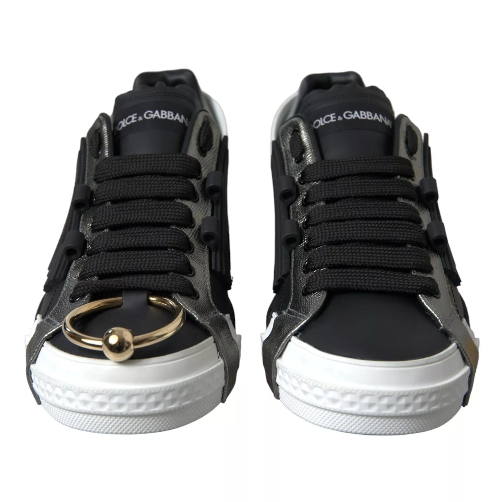 Black sneakers with gold ring on side