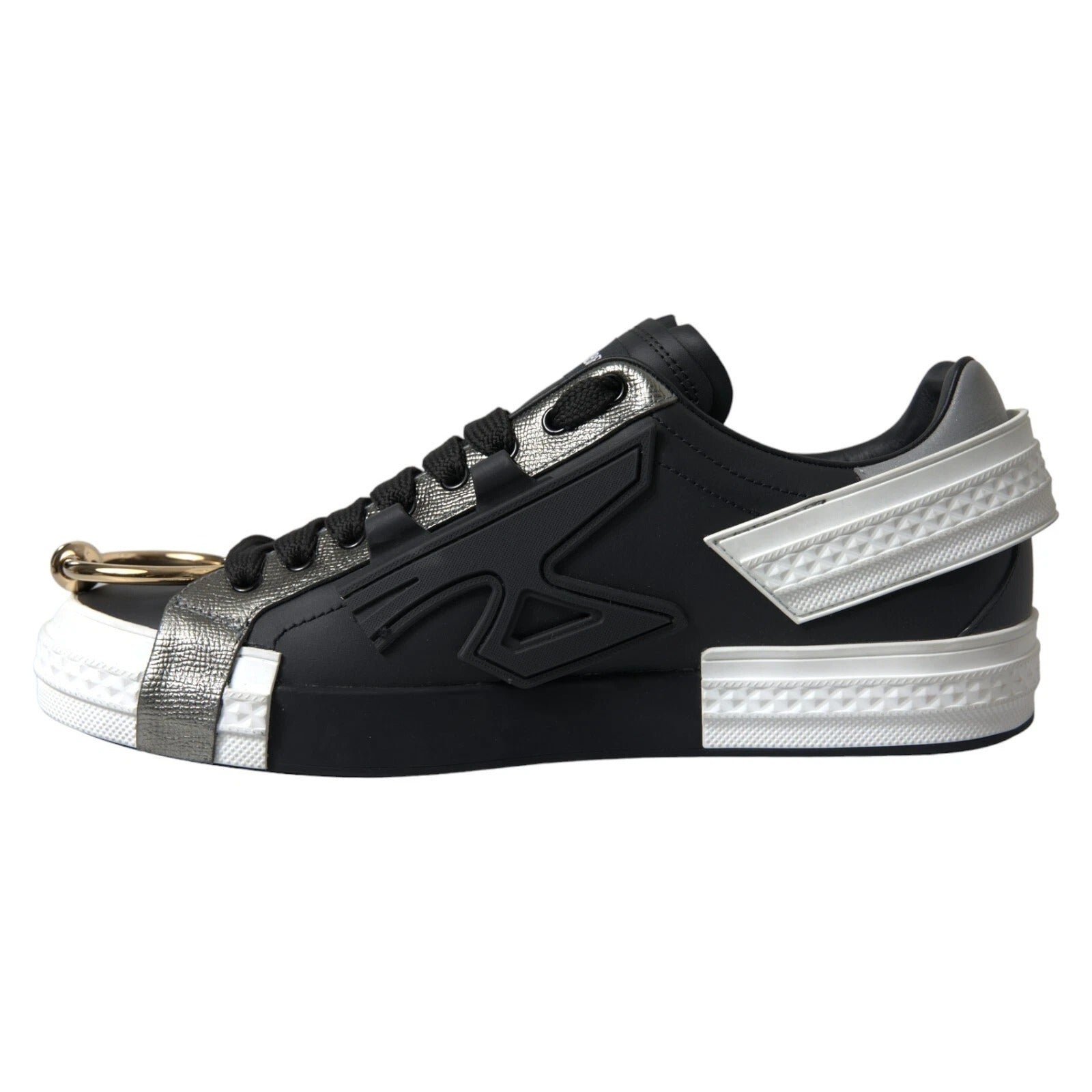 Black sneaker with white sole and silver accents