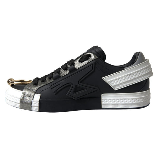 Black sneaker with white sole and silver accents