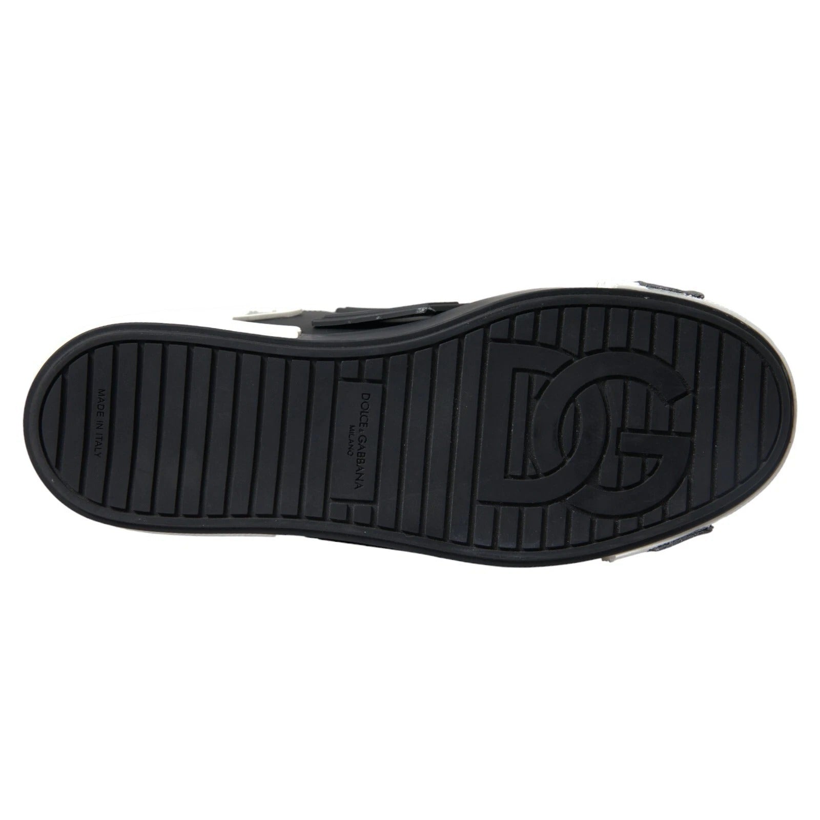 Black shoe with white logo on sole