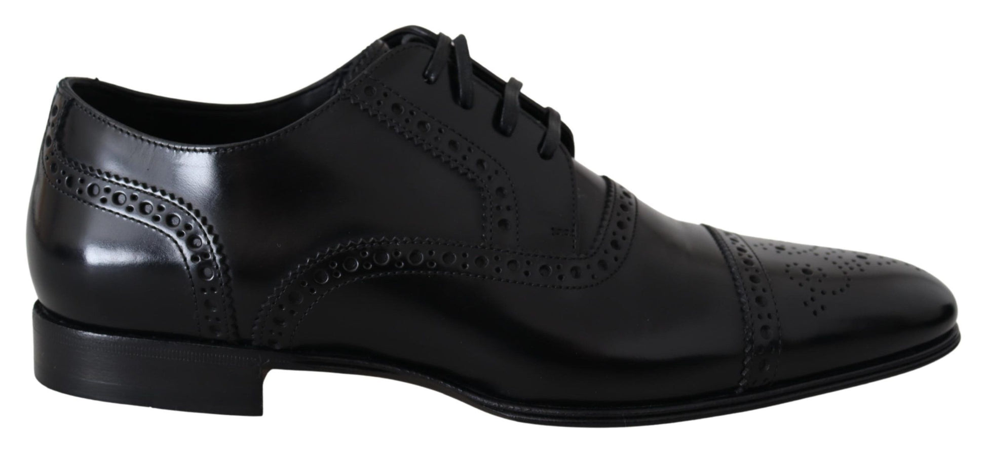 Pair of black dress shoes with laces and a small heel