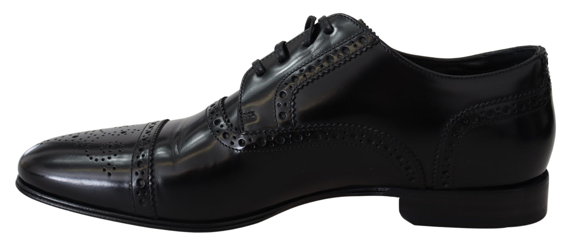 Pair of black dress shoes with laces and embroidery on vamp