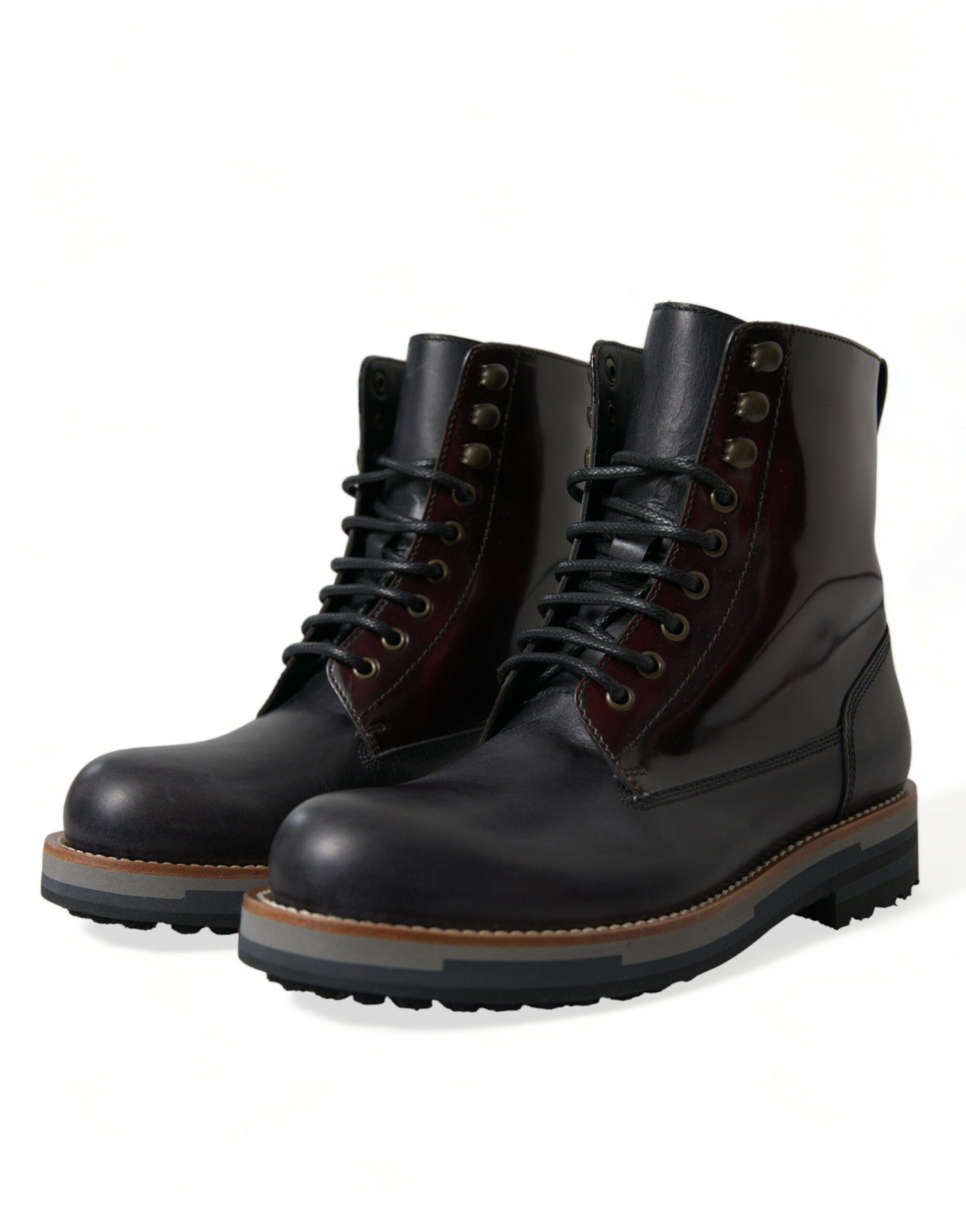 Pair of black leather boots with laces and metal eyelets