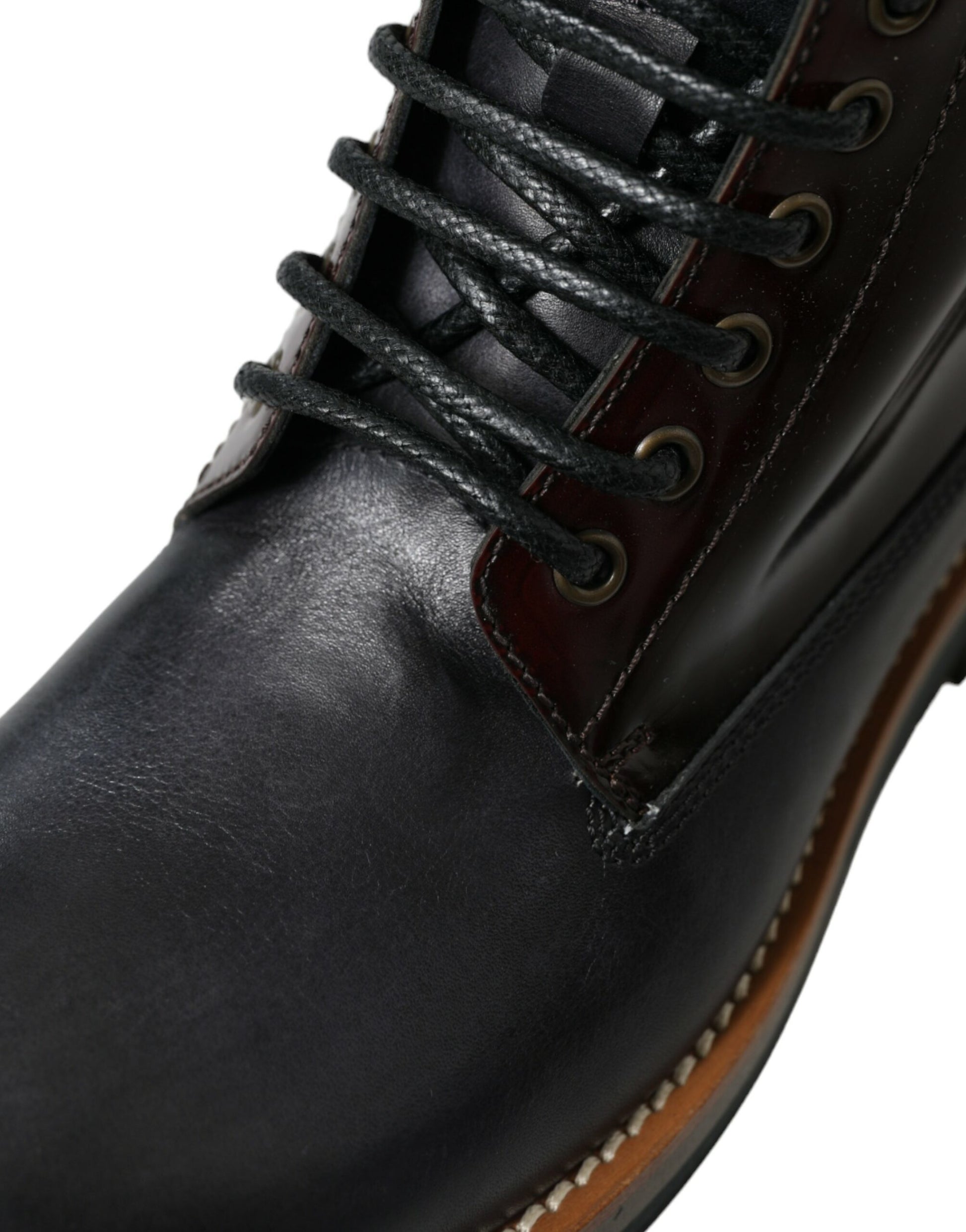 Black leather boot with laces and brown trim