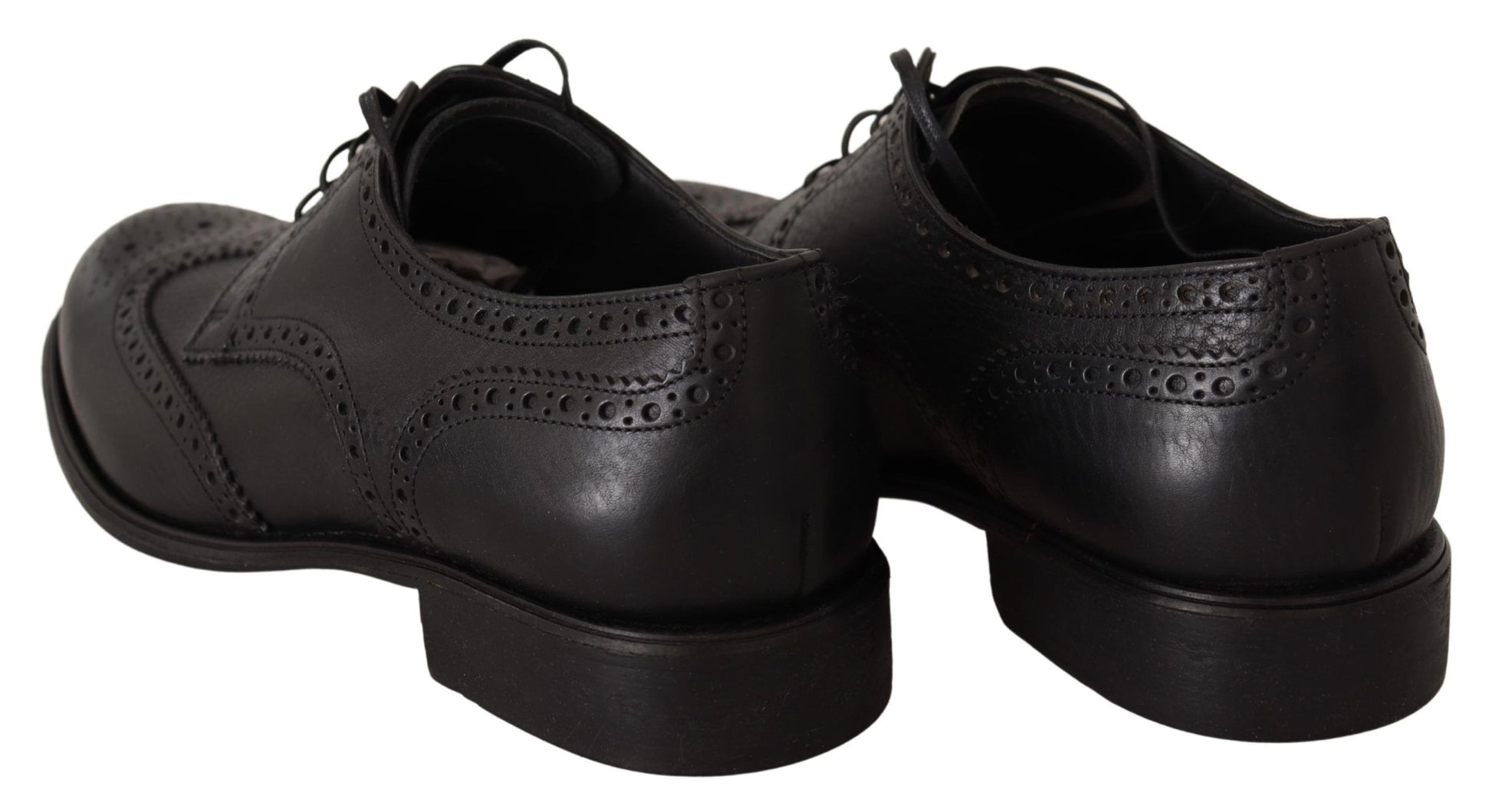 Pair of black dress shoes with laces and a small heel