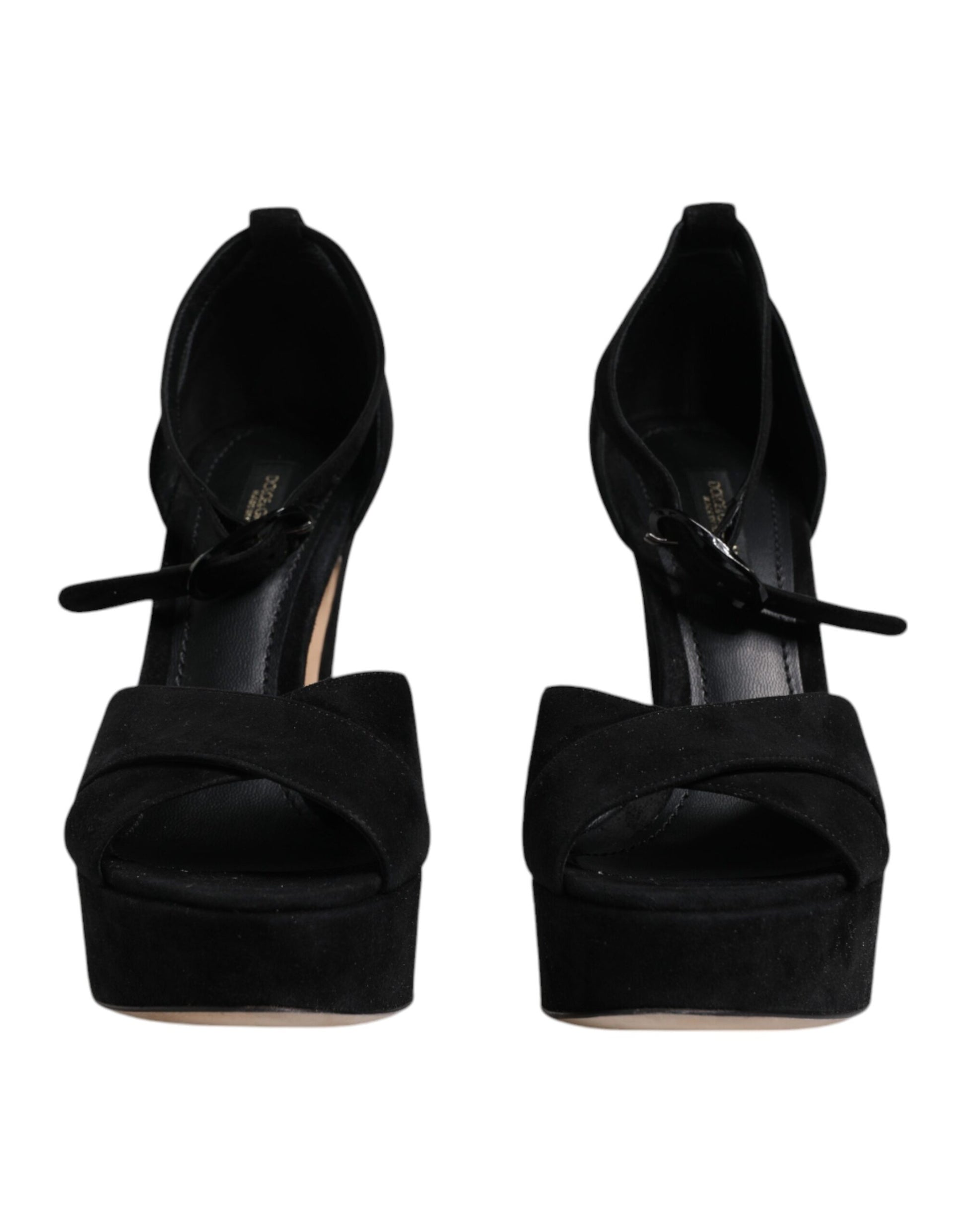 Pair of black high heel shoes with bow detailing