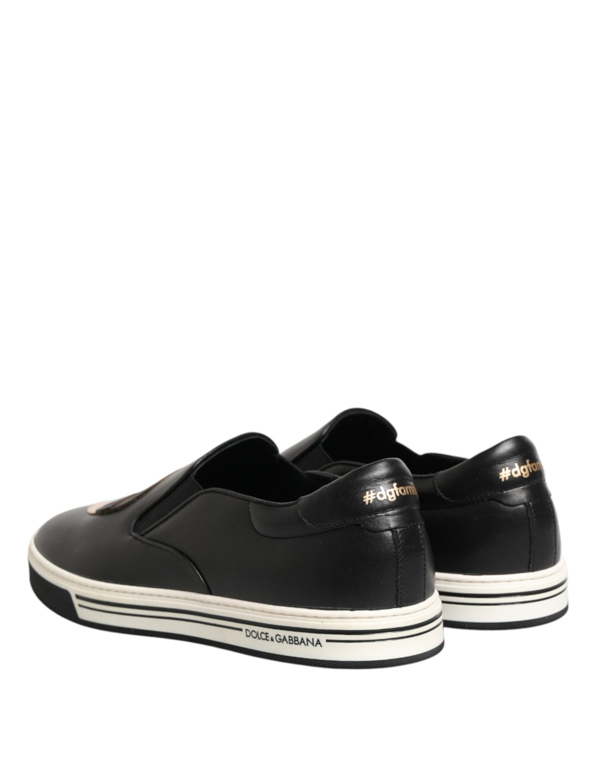 Pair of black sneakers with white soles