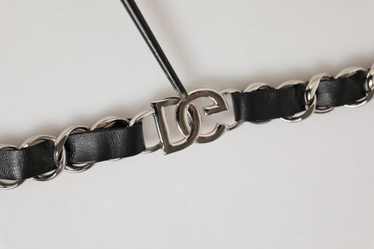 Black leather belt with silver buckle