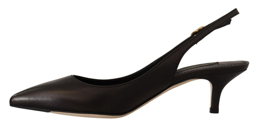 Pair of black high heel shoes with open toe and ankle strap