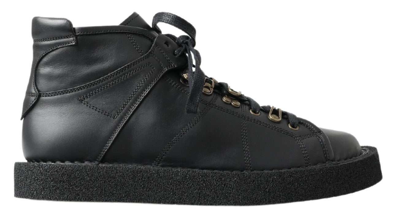 Black high top sneaker with laces and rubber sole