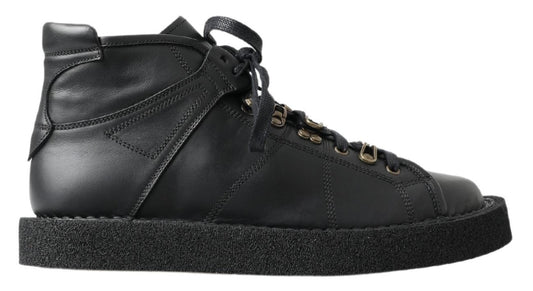 Black high top sneaker with laces and rubber sole