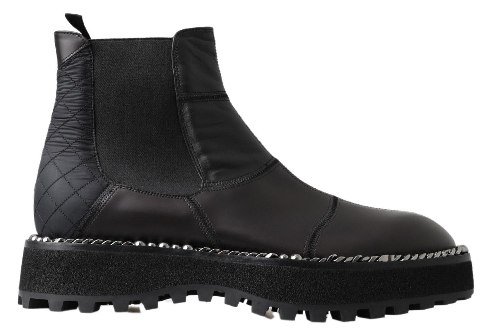Black leather work boot with metal studs and a thick rubber sole