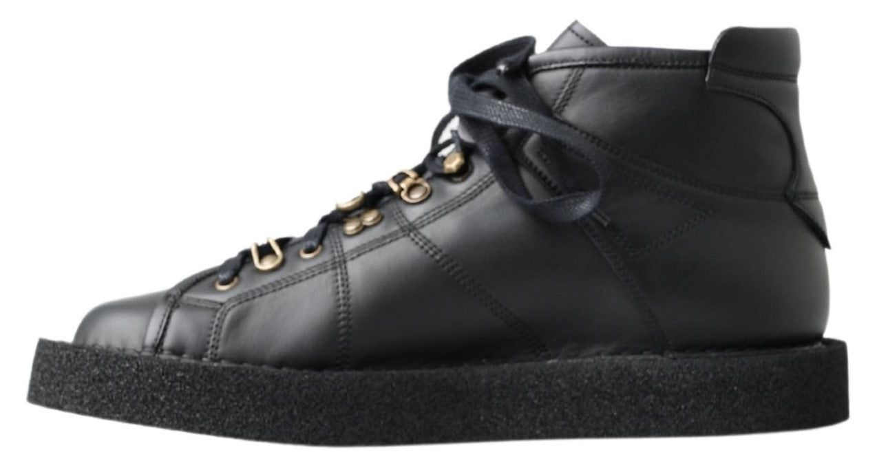 Black high top sneaker with laces and rubber sole
