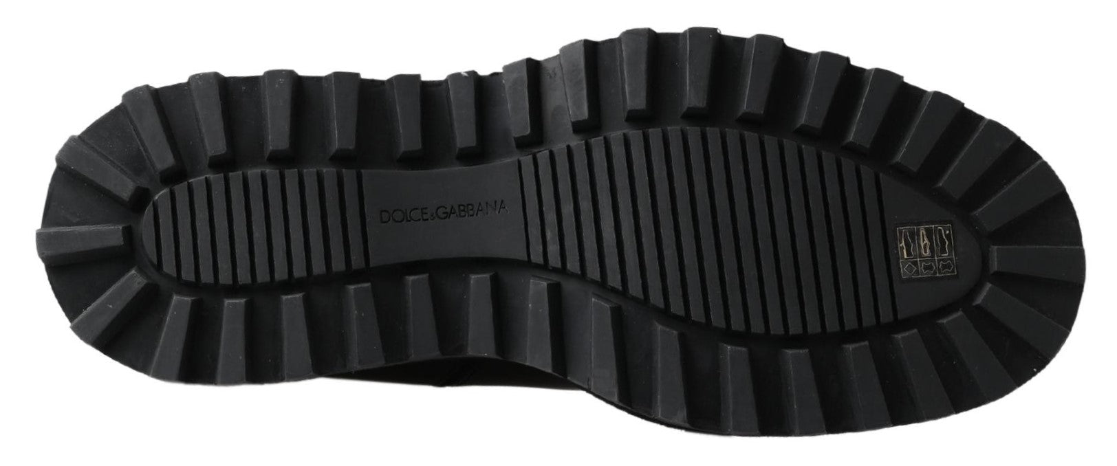 Black rubber boot with deep treads and a pull tab on the back