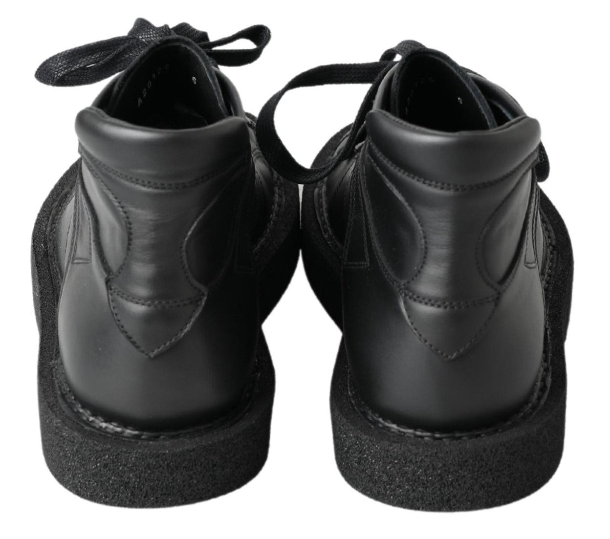 Pair of black leather shoes with laces and a glittery sole