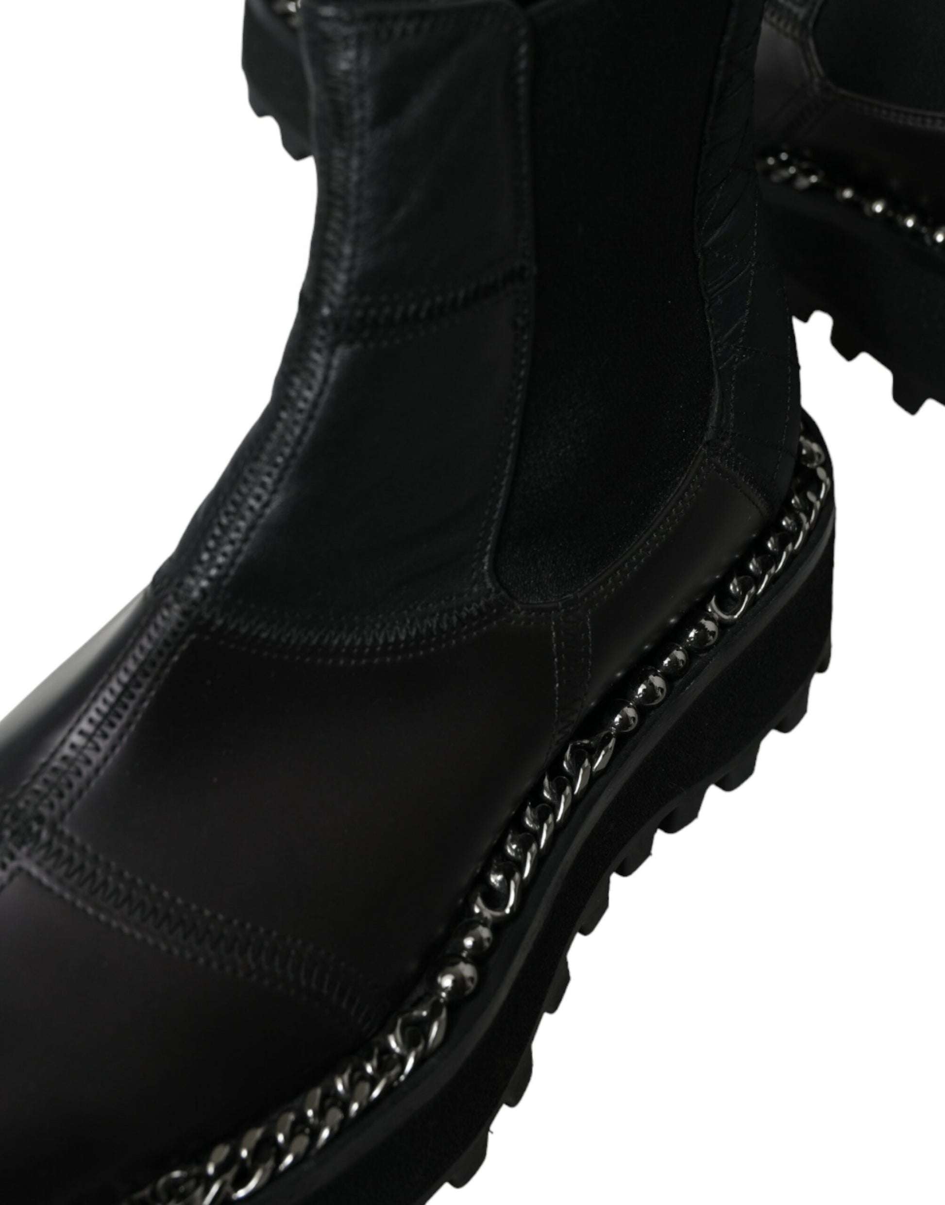 Black leather boot with silver studs and chains on side