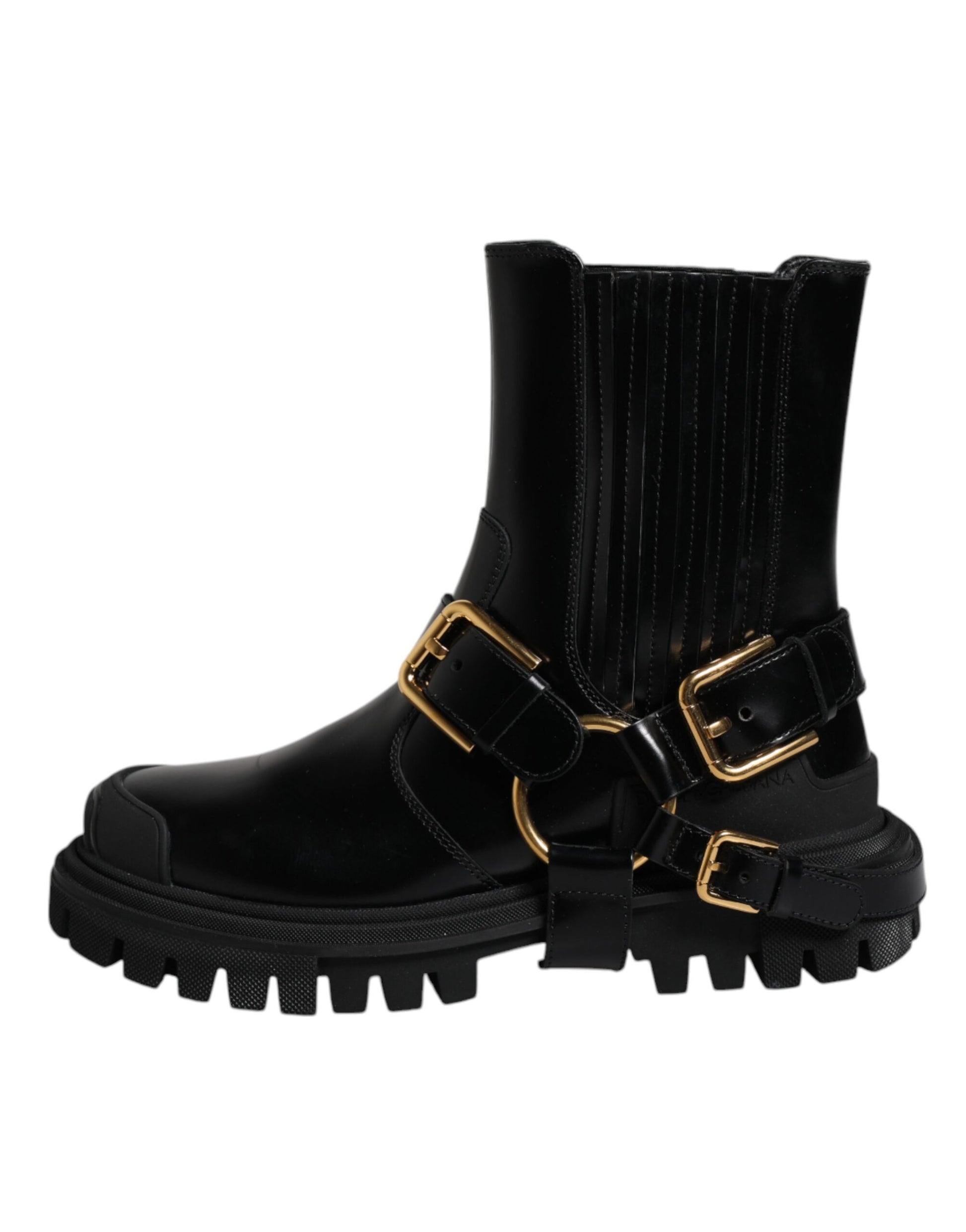 Black leather boot with gold buckles and studs