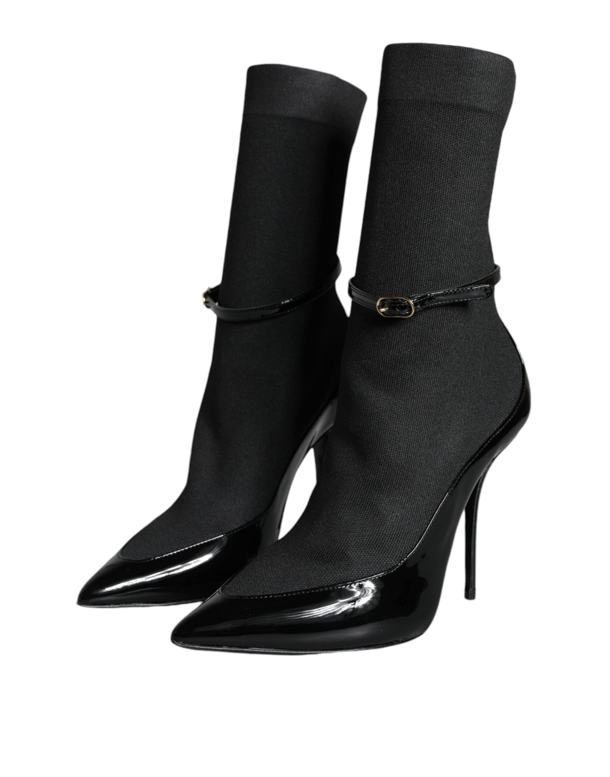 Pair of black knee high boots with heels