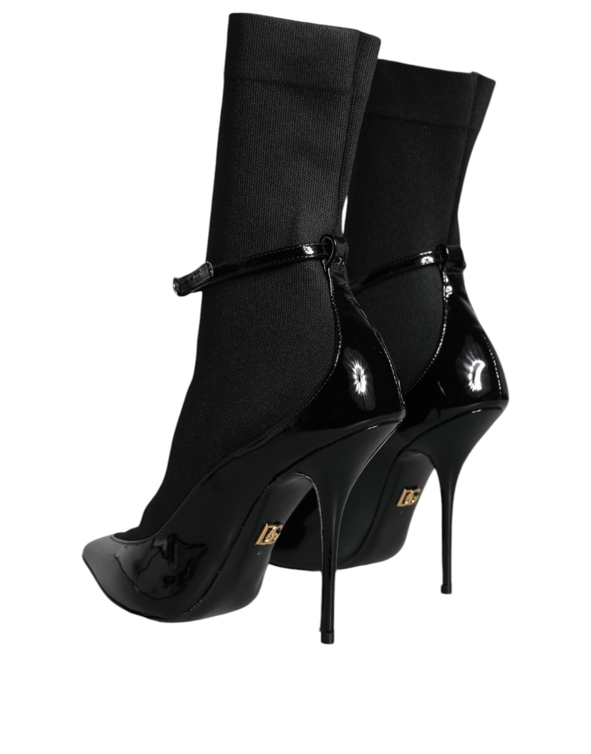 Pair of black high heel shoes with straps