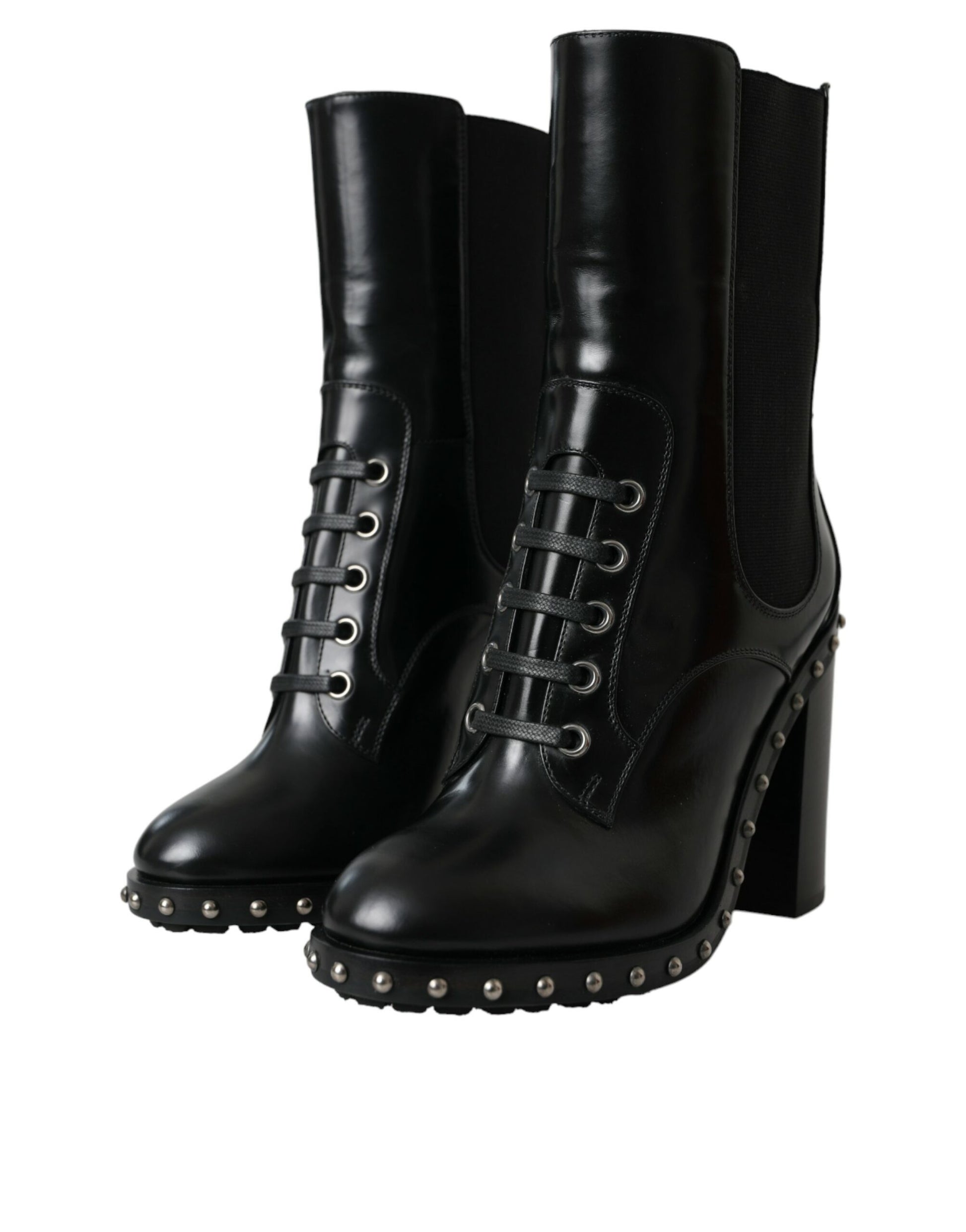 Pair of black leather boots with silver buckles and studs
