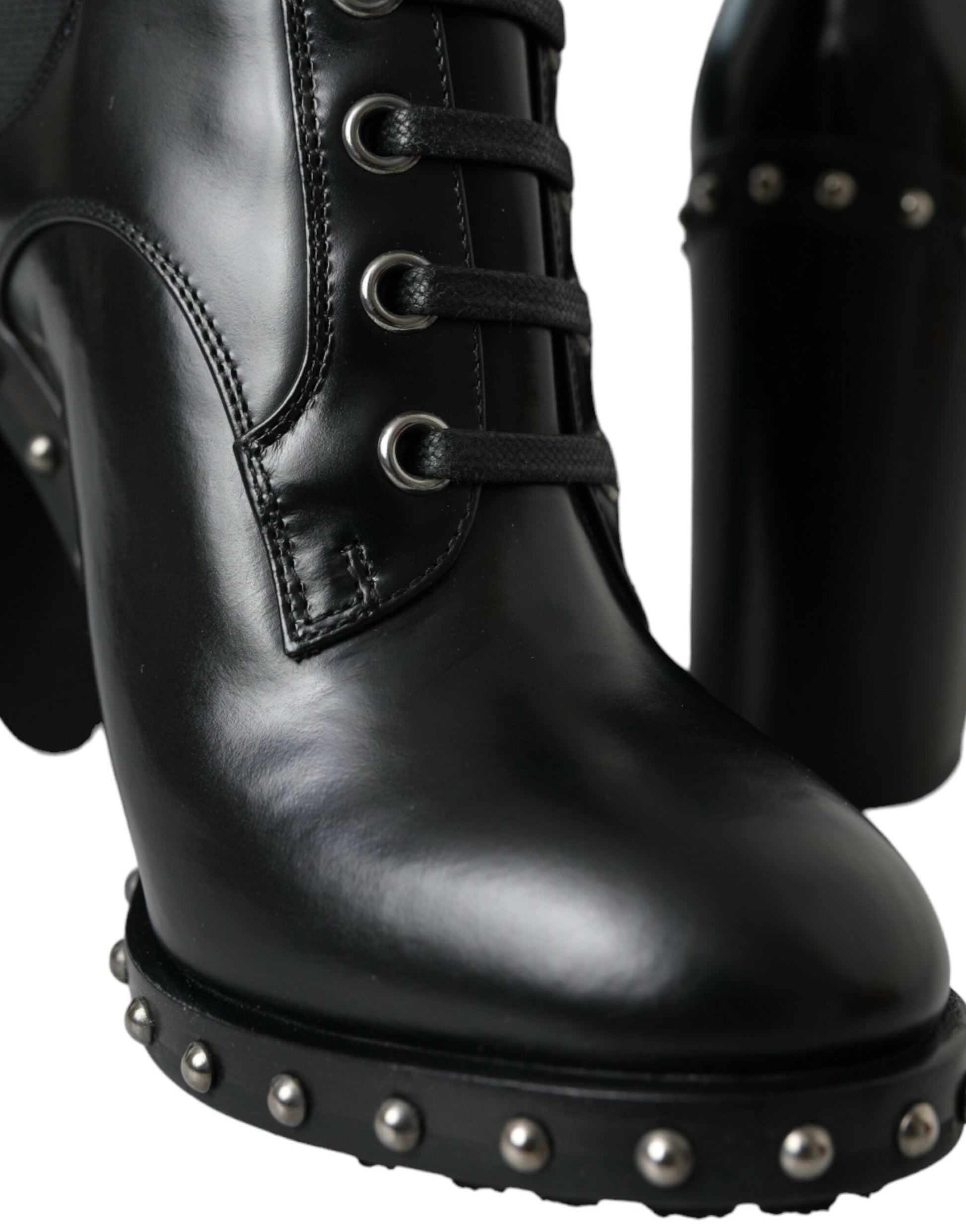 Black leather boot with silver studs and laces