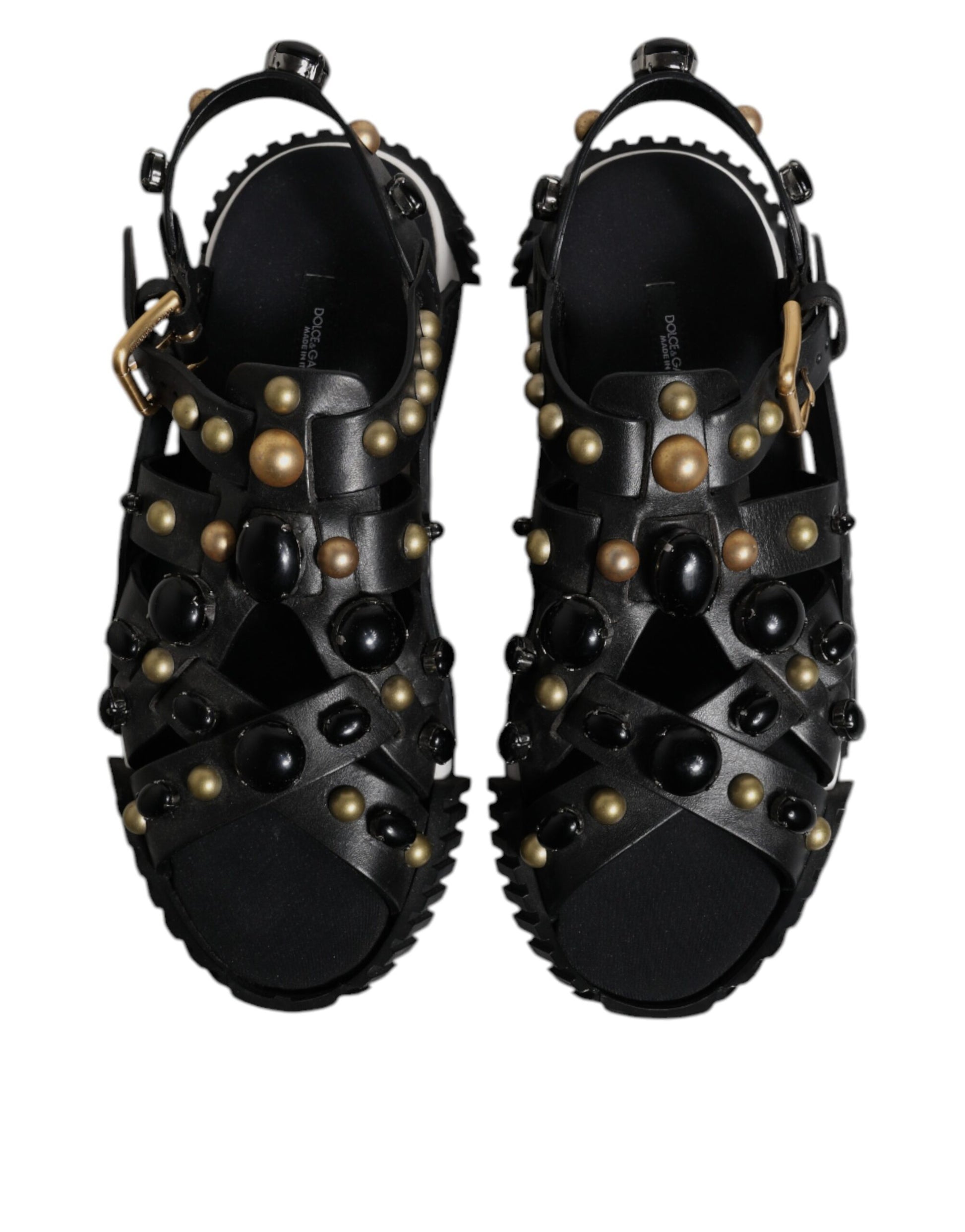 Pair of black sandals with gold beads