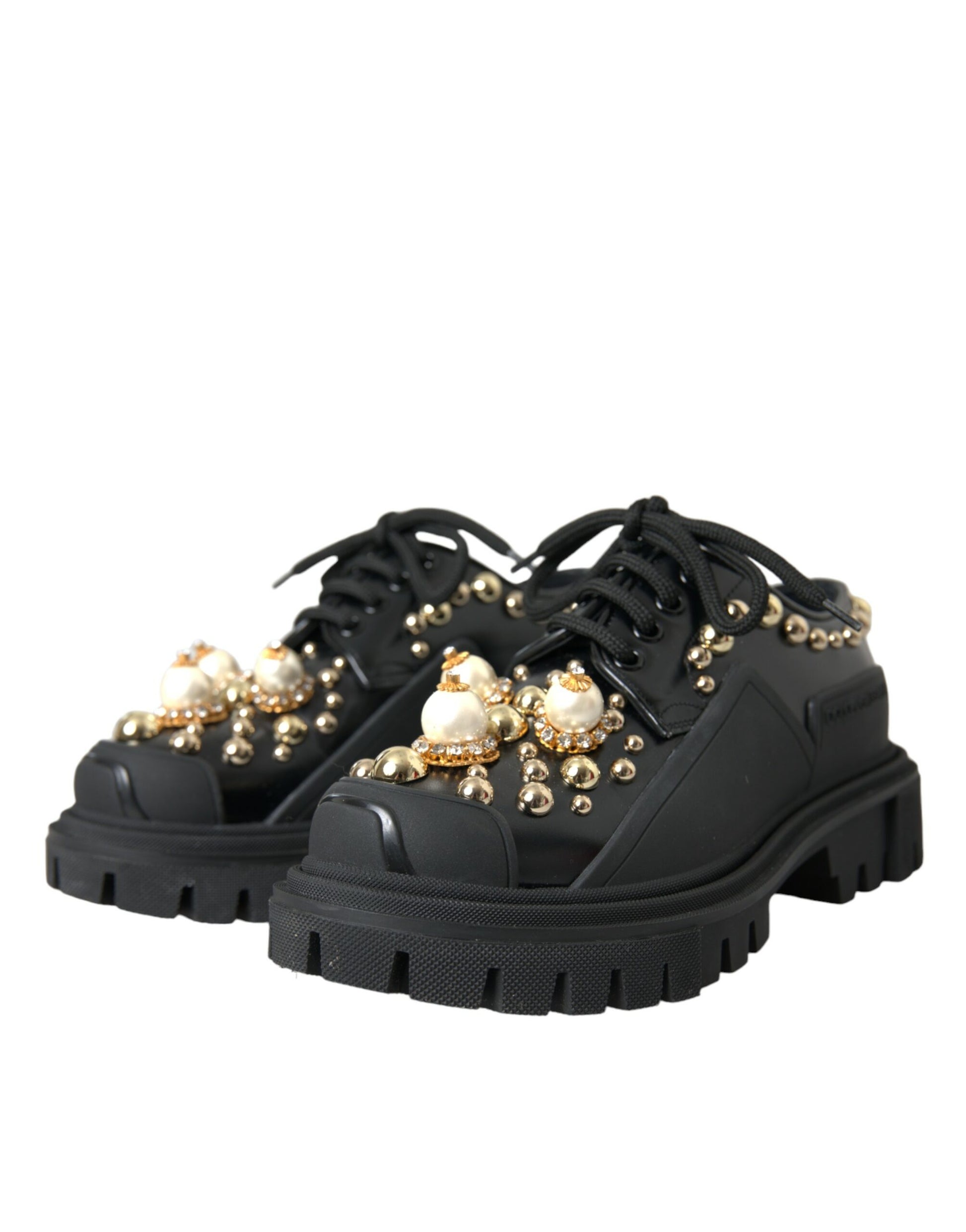 Black children's boots with gold embellishments and chunky heels